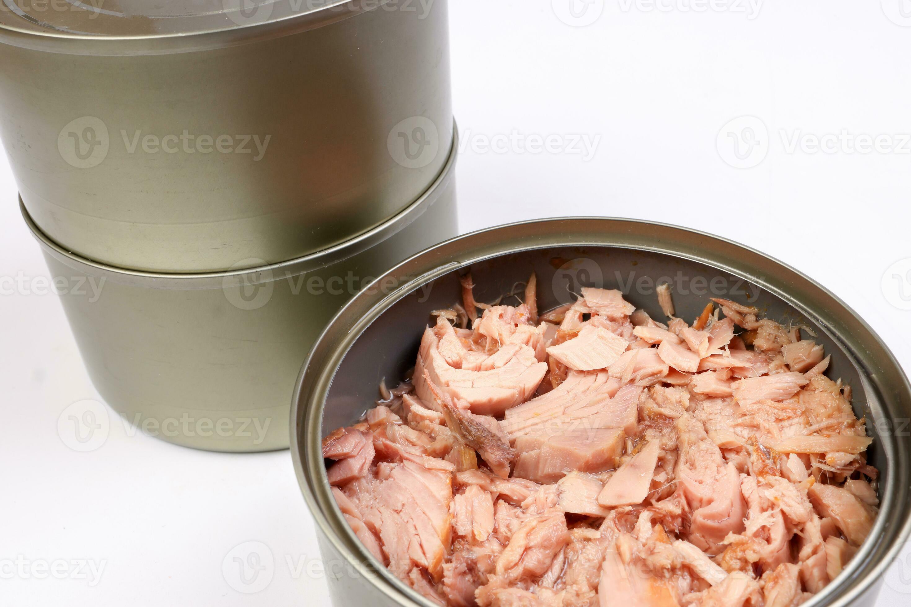 Tuna fish meat flaky chunk in tin can on white background 24511172 Stock Photo at Vecteezy
