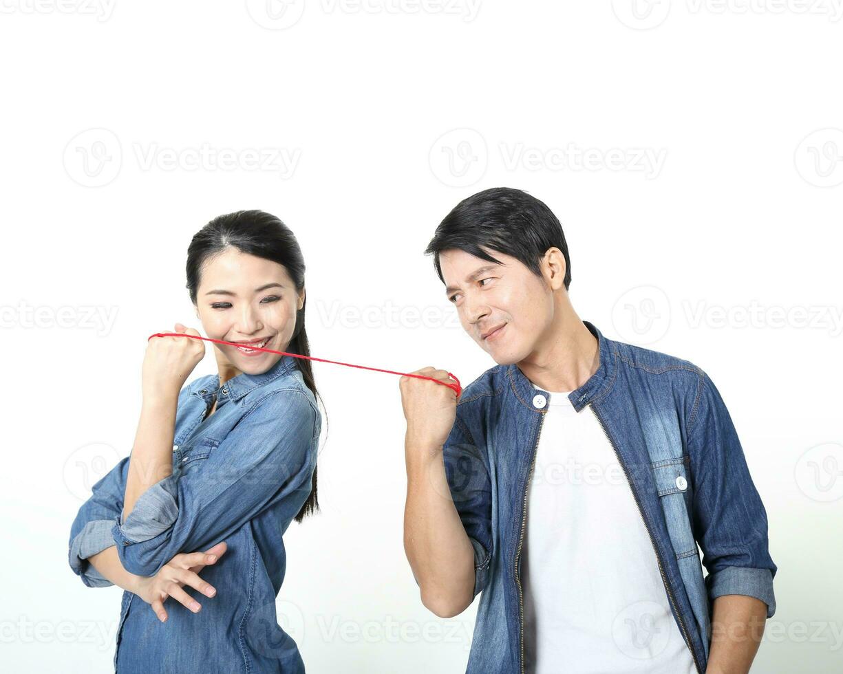 South East Asian young father mother daughter  parent girl child activity indoor photo