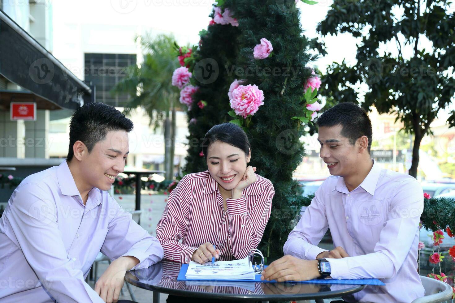Young south east Asian middle eastern man woman business colleague outdoor stand pose photo