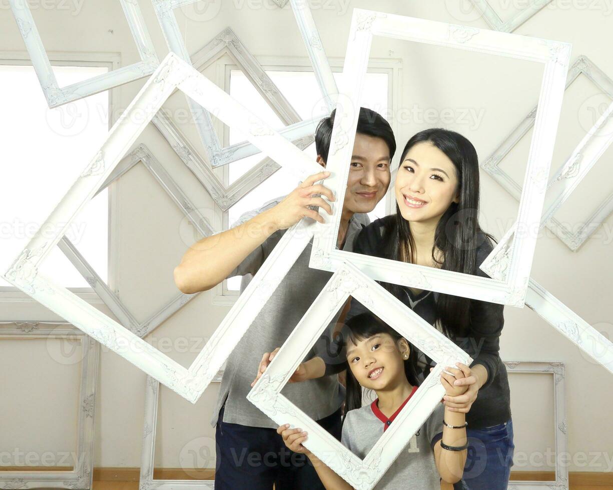 South East Asian young father mother daughter  parent girl child activity photo