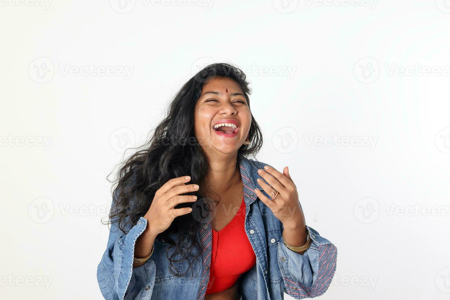 Young attractive Asian Indian woman pose face body expression mode emotion on white background laugh happy photo