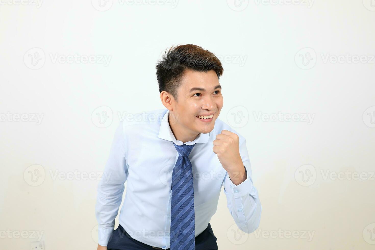 South east Asian chinese Man facial expression happy smile exited fist photo