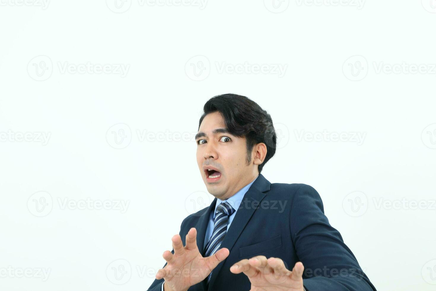 South east Asian Malay Man facial expression shocked scared afraid hand in front self protect photo