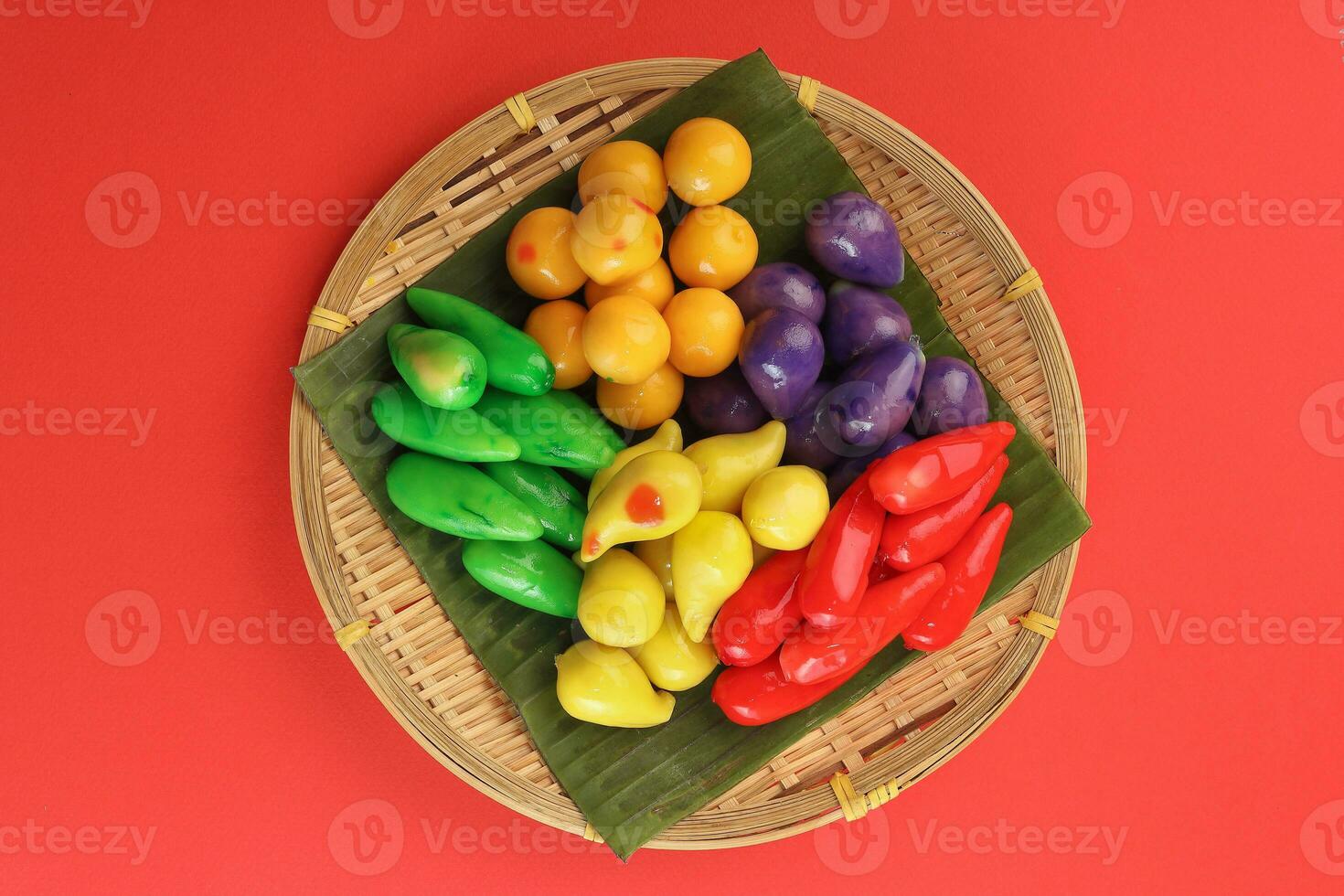 Colourful Luk chup look choop tadeonal Thai desert sweets candy creatve variety bamboo plate banana leaf photo