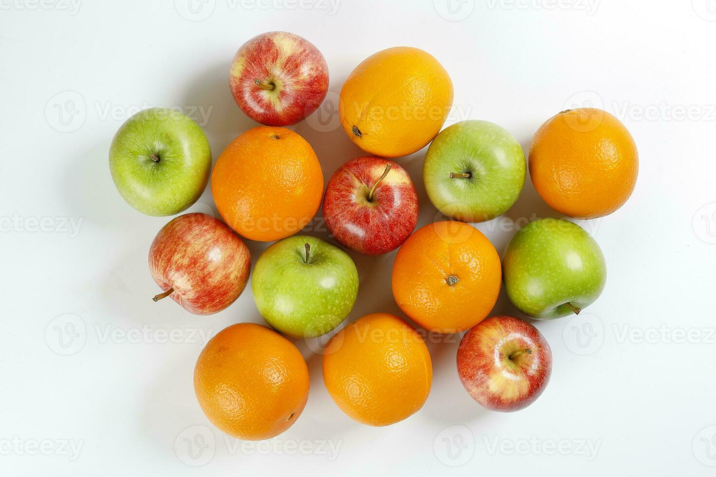 red green apple orange fruit on white background photo