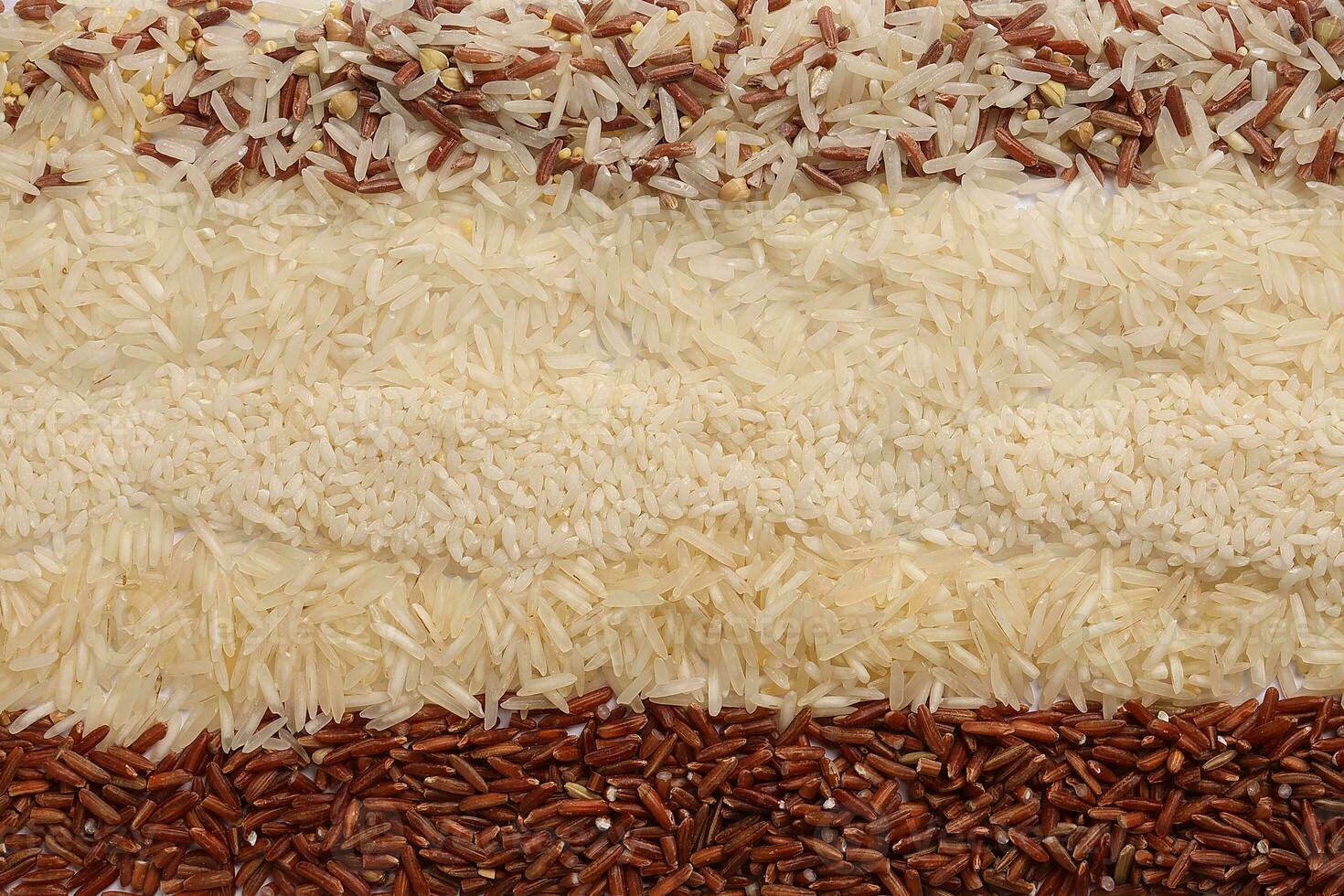 Varity mix long grain basmati medium grain jasmine short grain pilaf risotto brown low glycaemic index GI rice in rows top view photo