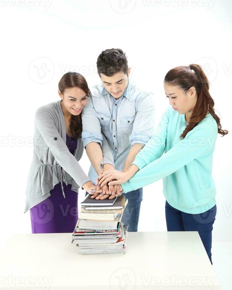 Yong south east Asian middle eastern Caucasian youth man woman in casual dress walk talk fun sit at table book notebook pen laptop computer study think read on white background photo