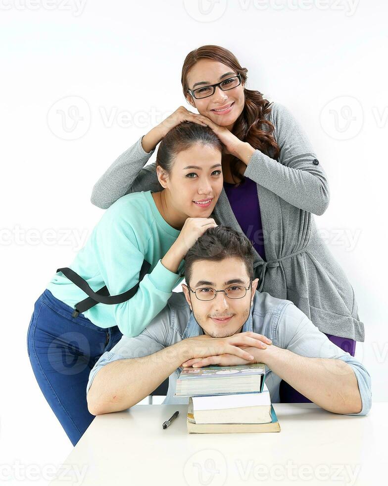 Yong south east Asian middle eastern Caucasian youth man woman in casual dress sit stand at table book stack head on head happy smile look at camera on white background photo