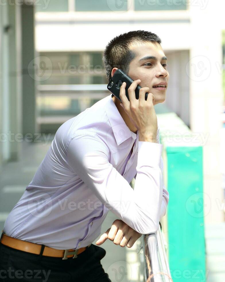 Young south east Asian middle eastern man woman business colleague outdoor stand pose photo