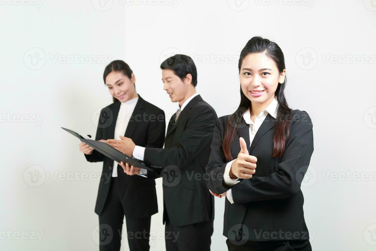 Young Asian man woman wearing business office suit stand white background photo