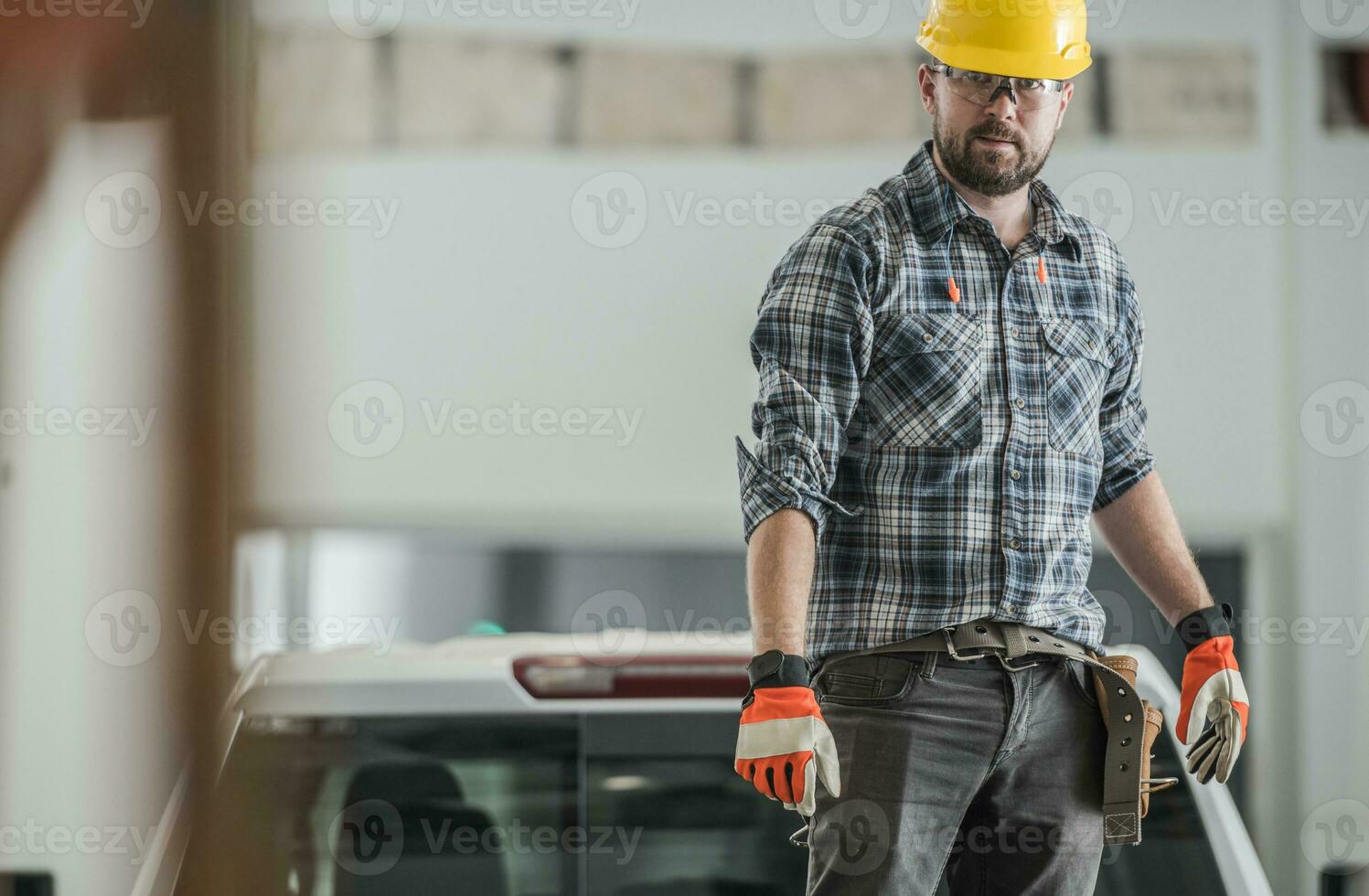 Professional Construction Worker on Building Site photo