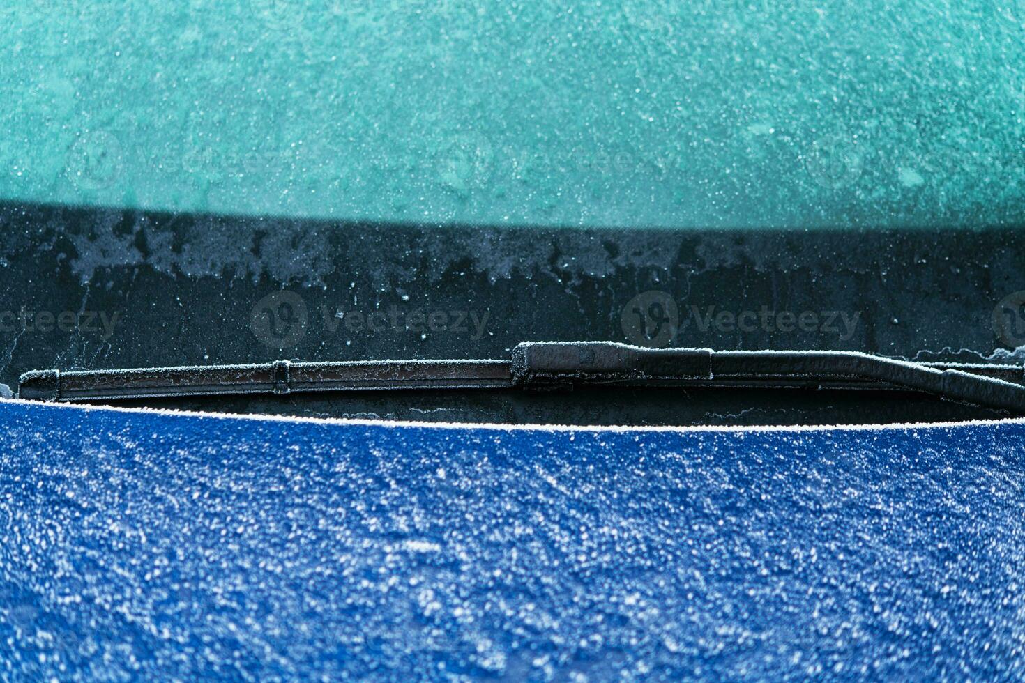 Car Windshield Wipers in Freezing Winter Condition photo