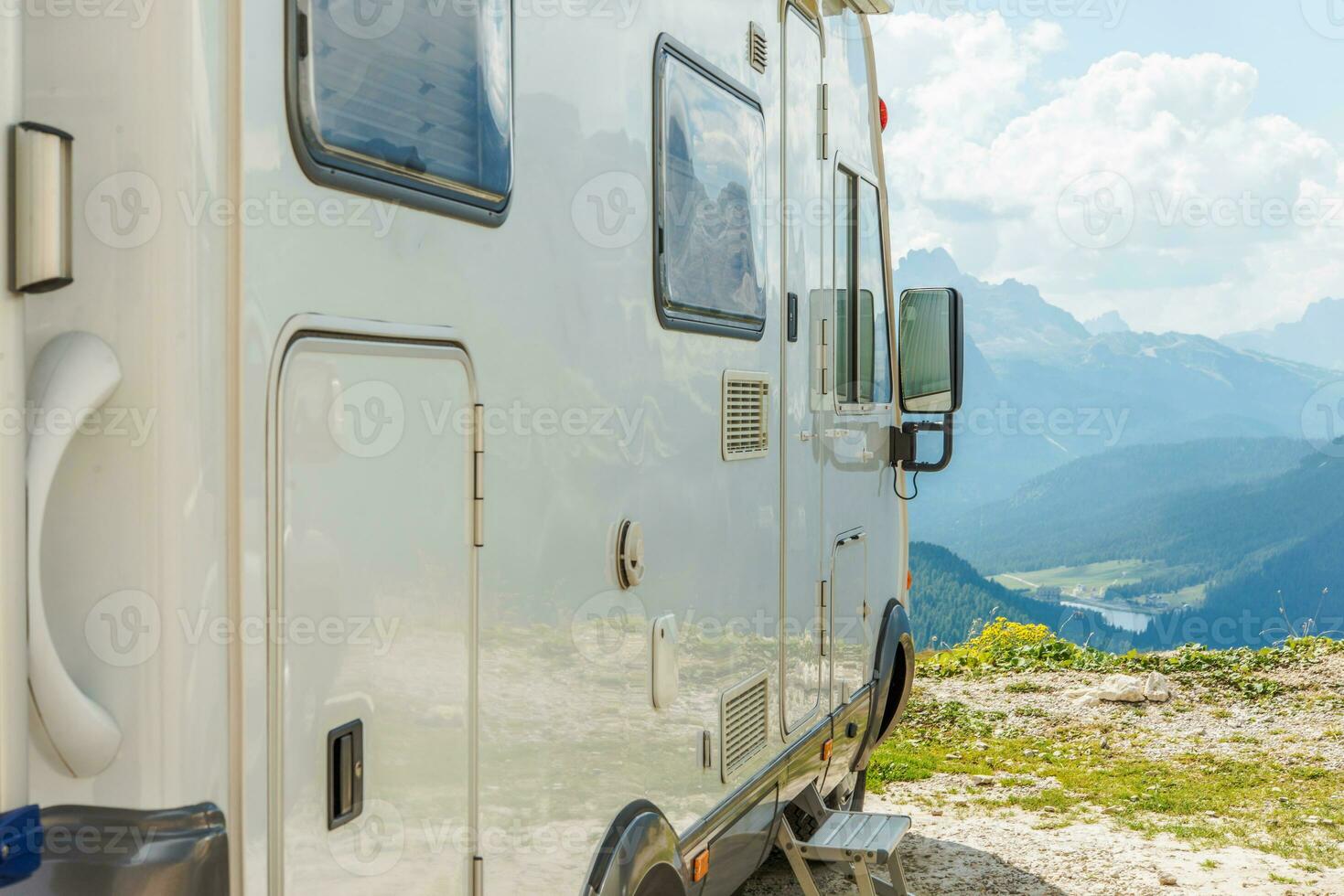 RV Parked On Mountain Peak. photo