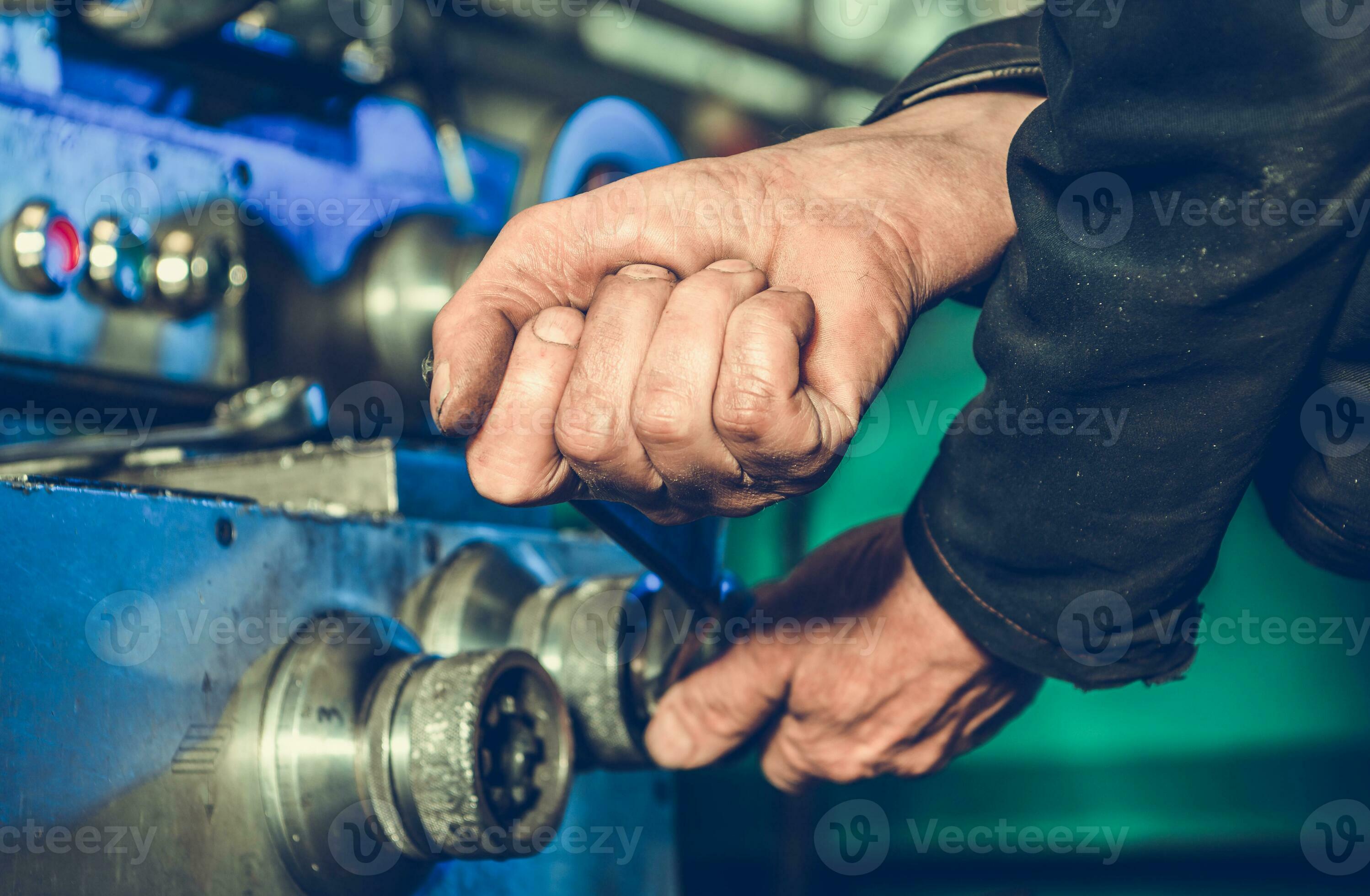 Senior Lathe Machine Operator 24519250 Stock Photo at Vecteezy
