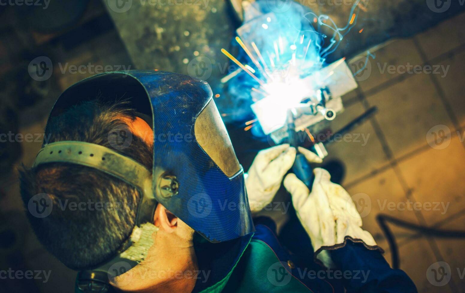 Welder and His Welding Job photo