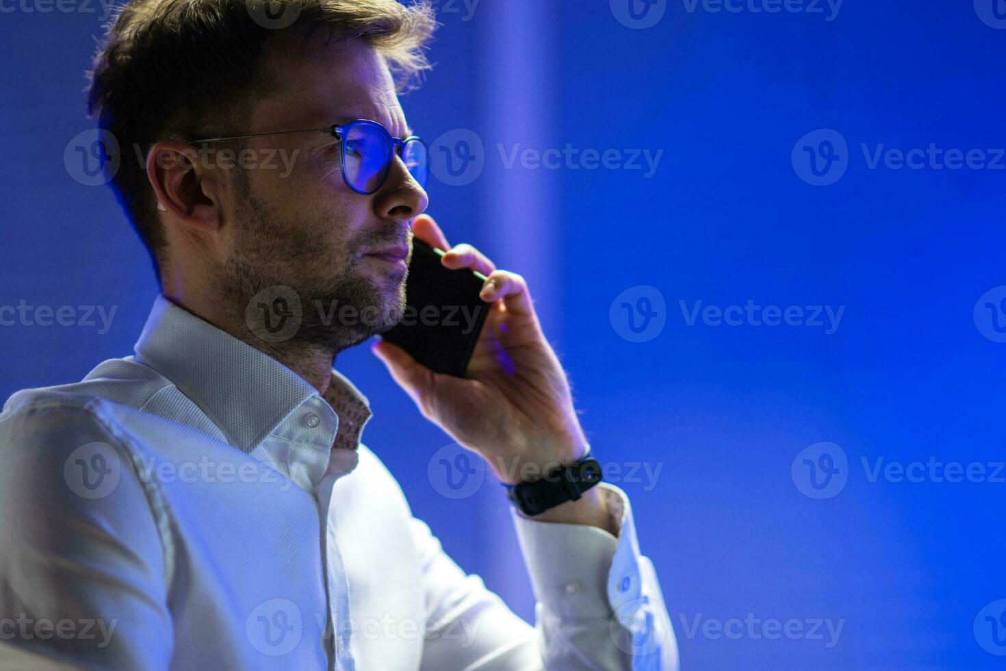 Caucasian Businessman Talking on the Phone photo