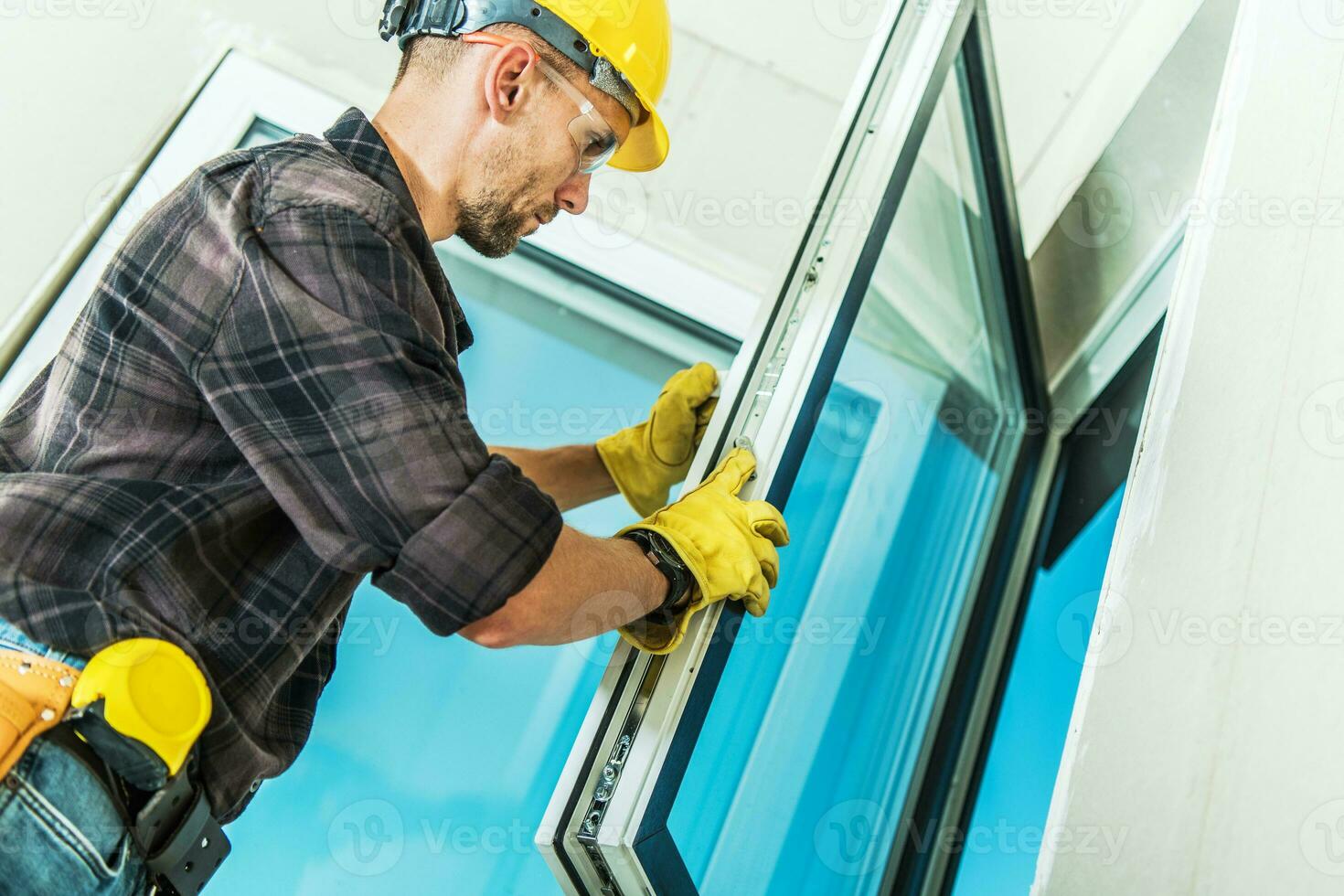 Contractor Installing the Window photo