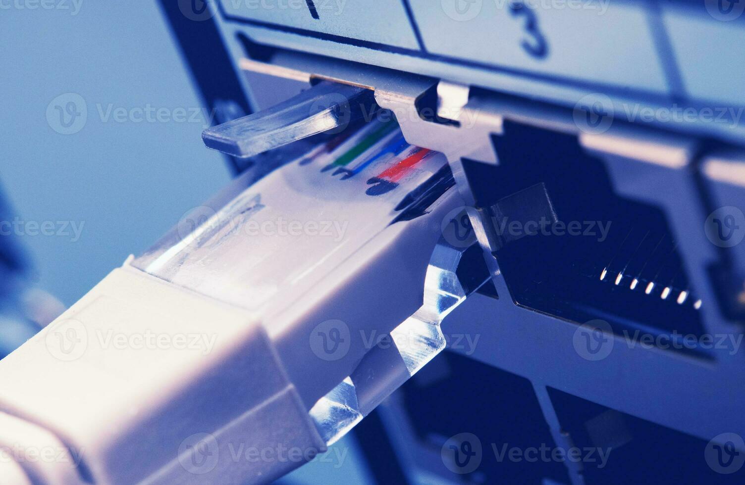 RJ 45 Cable Inserted Into Server Machine photo