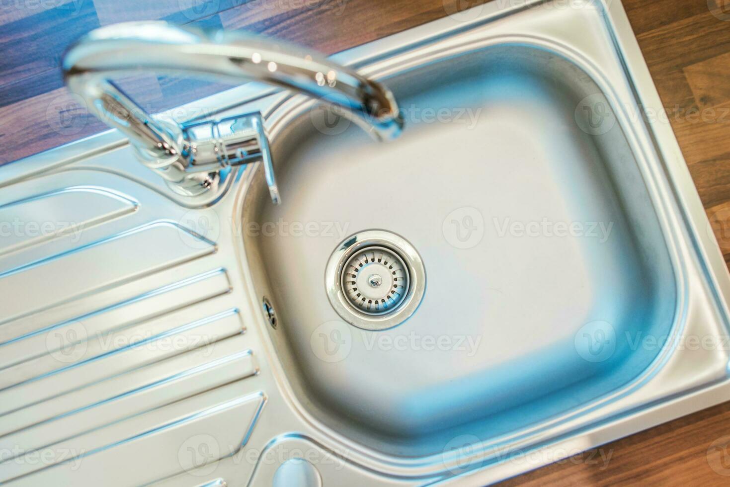 Single Bowl Stainless Steel Kitchen Sink And Faucet. photo