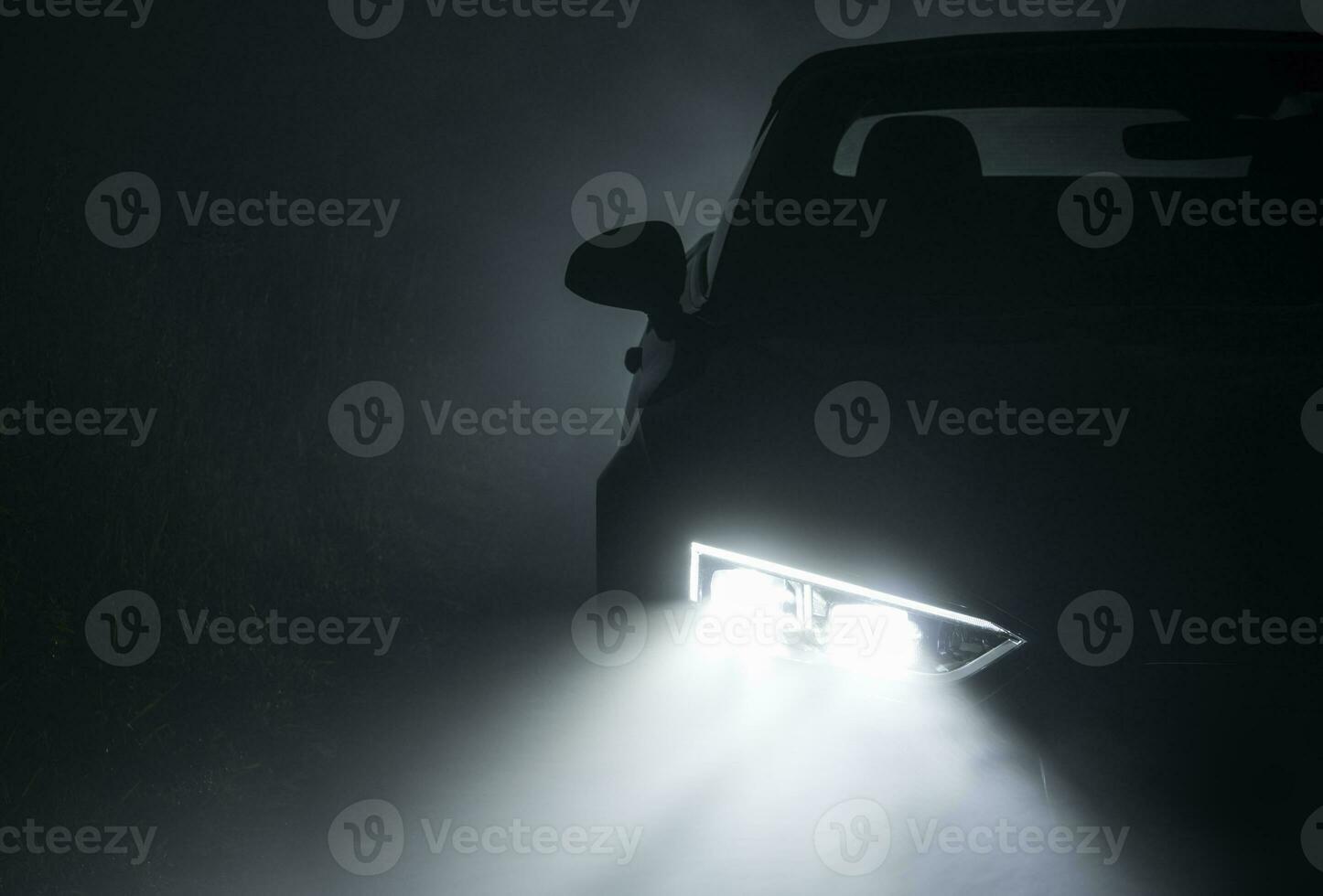 Modern Active Car LED Headlights Performing in Fog photo