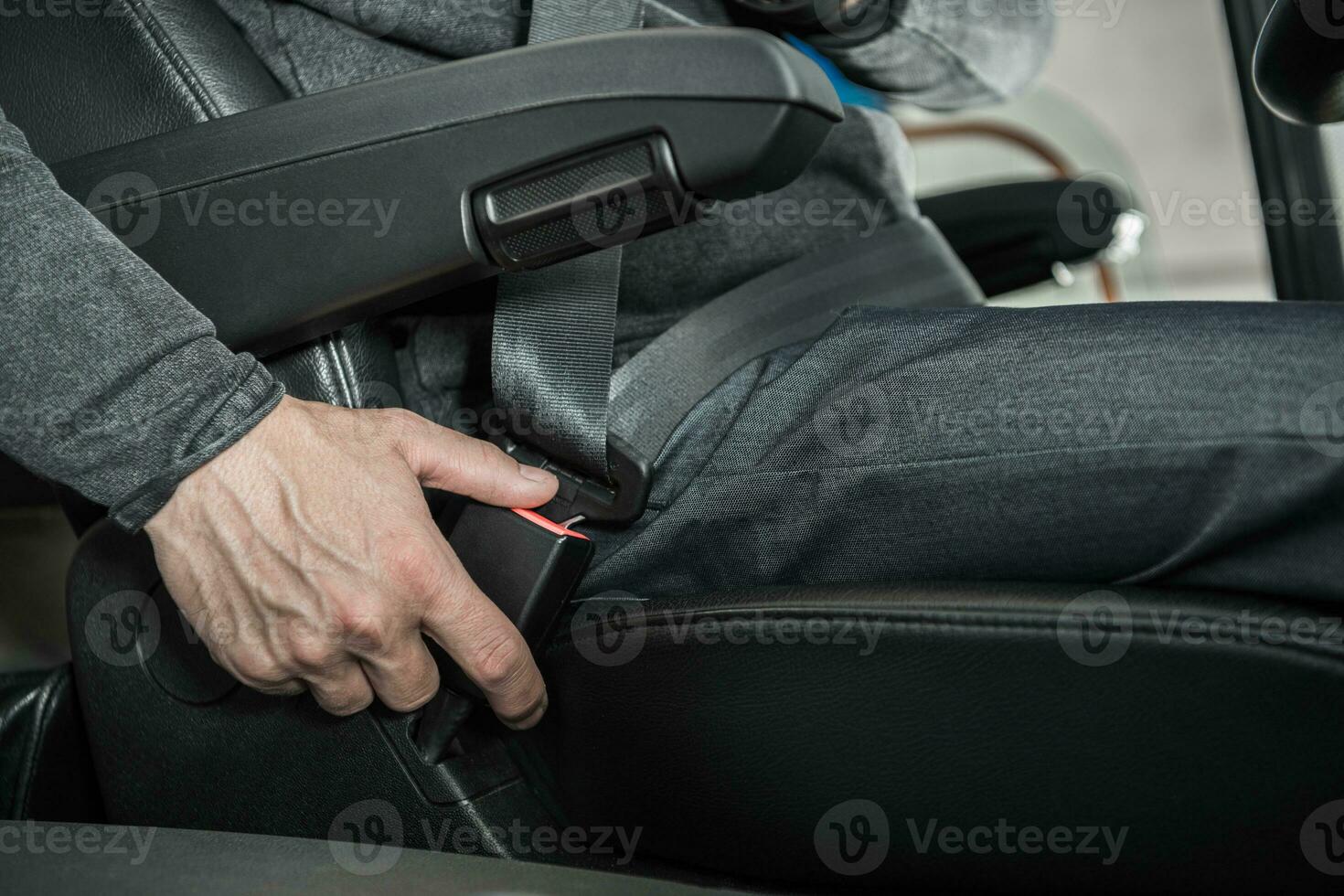 Seat Belt Fastening by Caucasian Bus Coach Driver photo