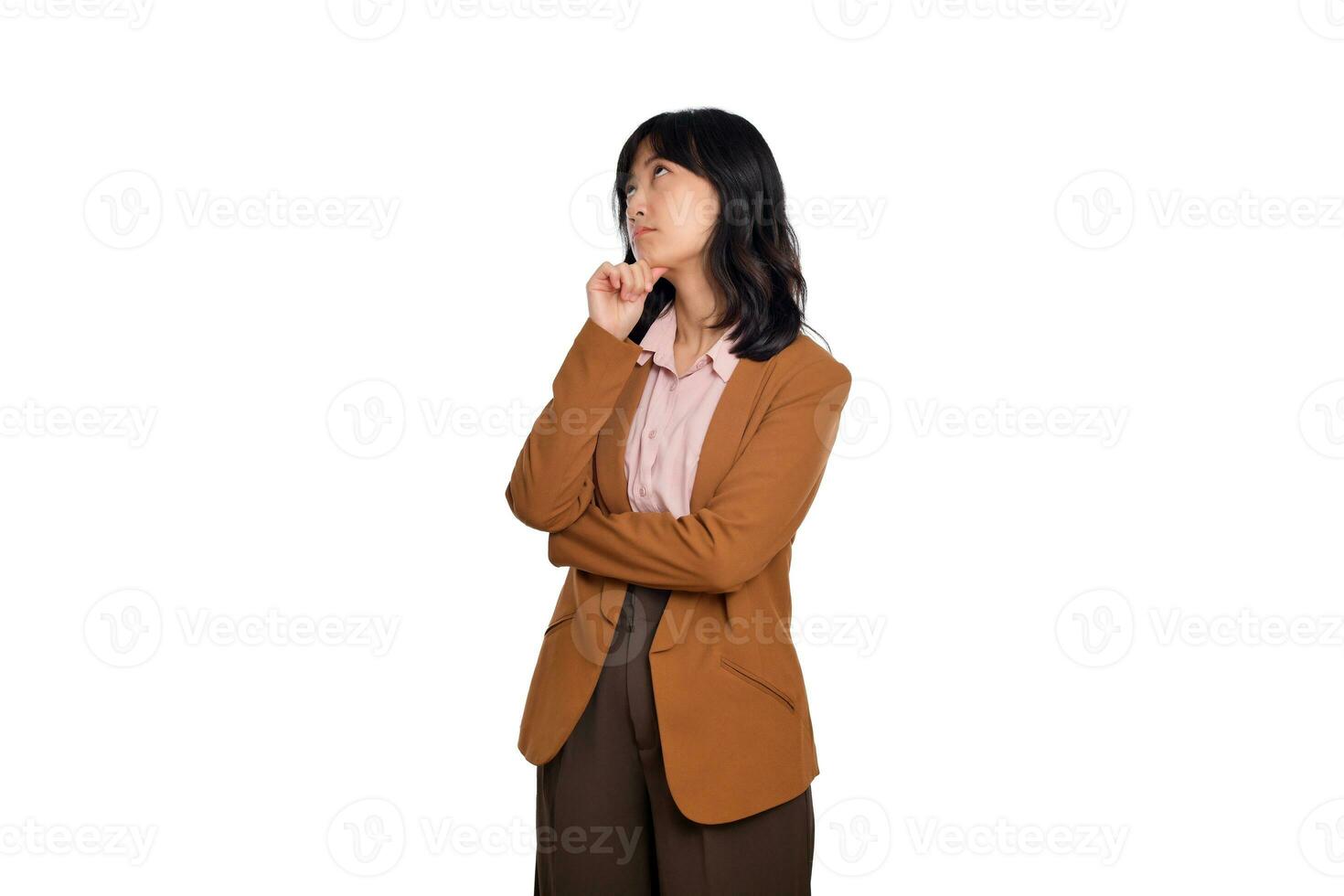 Beautiful asian business woman isolated on white background with hand on chin thinking about question, pensive expression. Girl with thoughtful face. Doubt concept photo