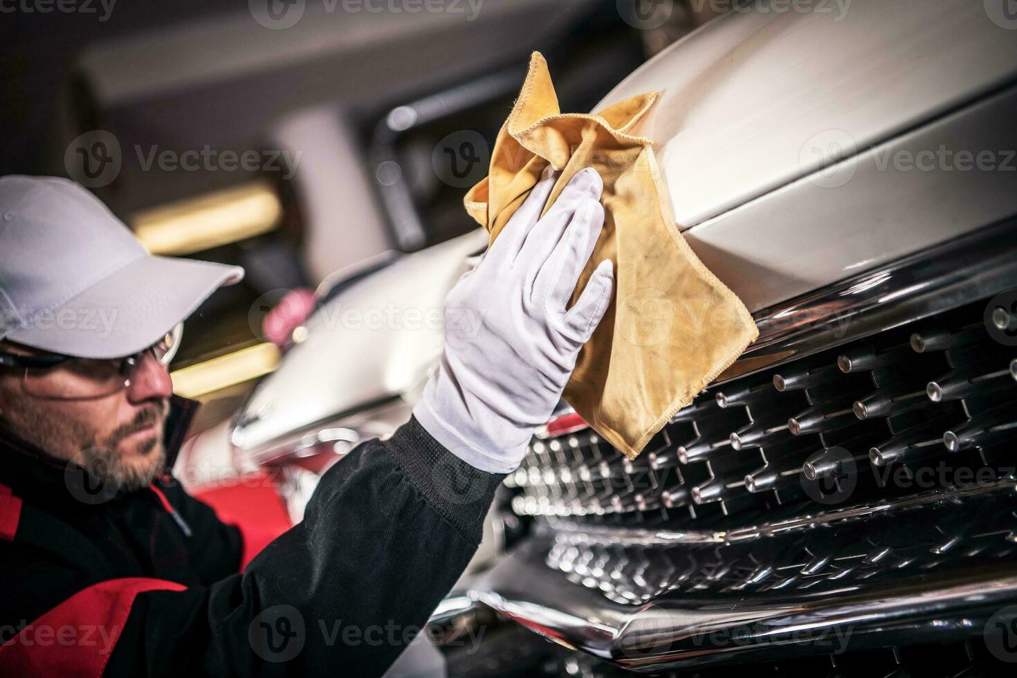 Men Cleaning Classic Car photo