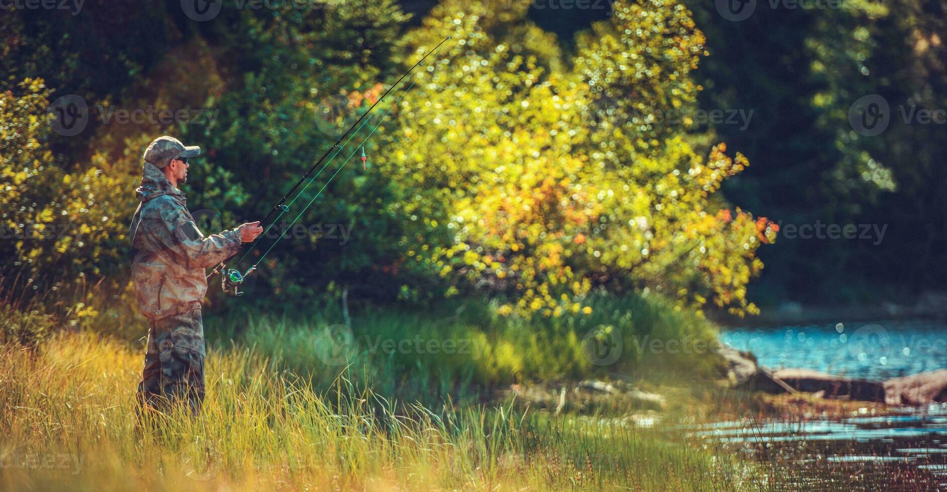 Men Fly Fishing in a River photo