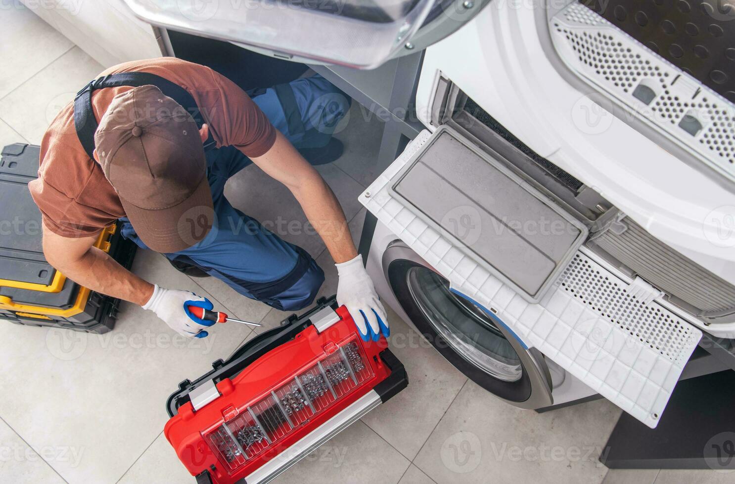 Washing Machine Fixing by Caucasian Professional Technician photo
