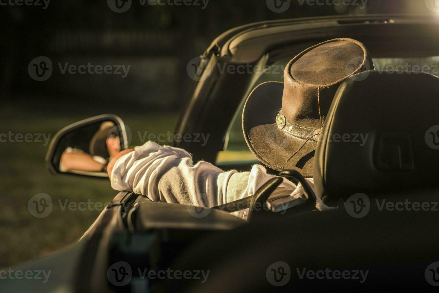 Cowboy in a Convertible Car photo