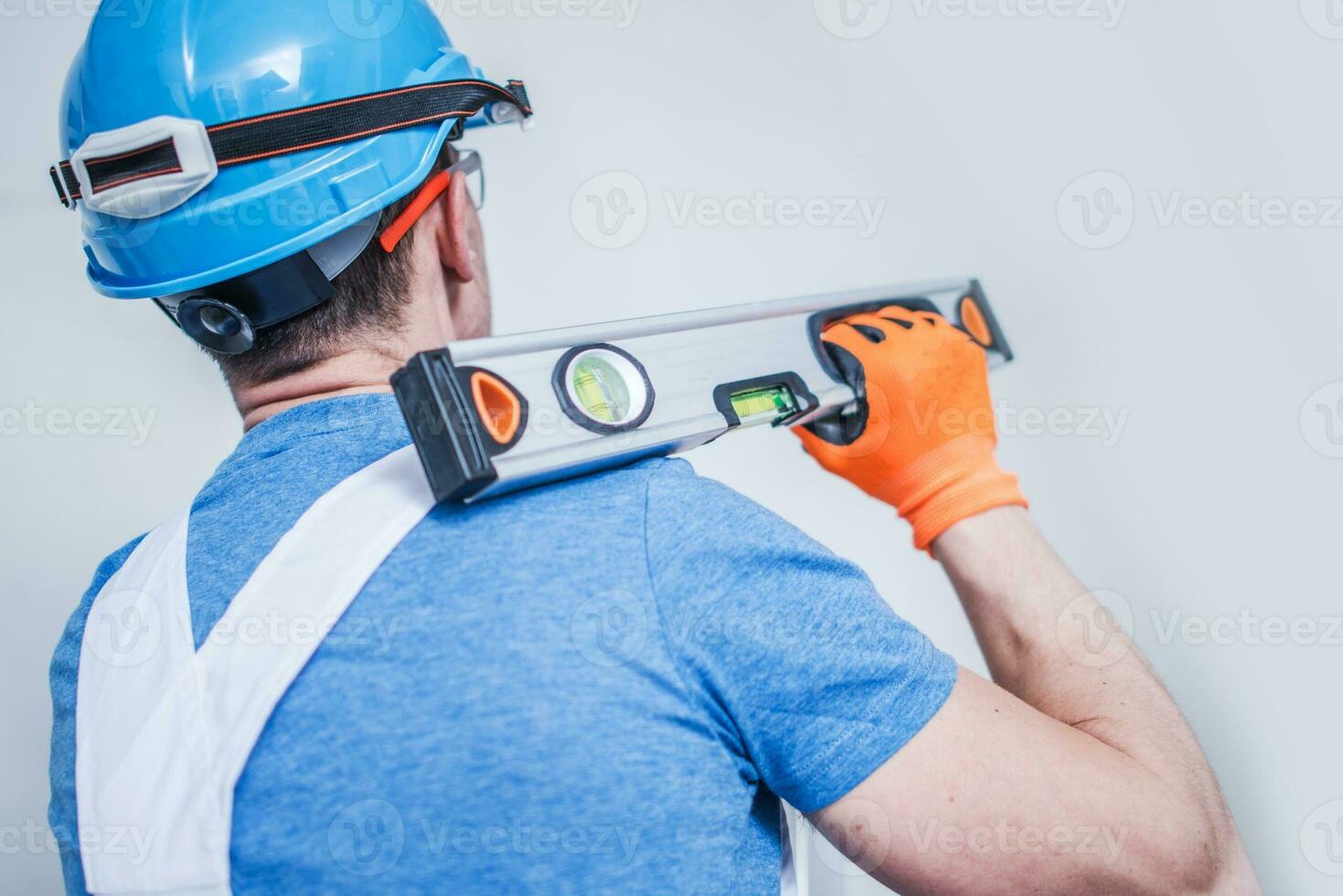 Worker with Spirit Level photo