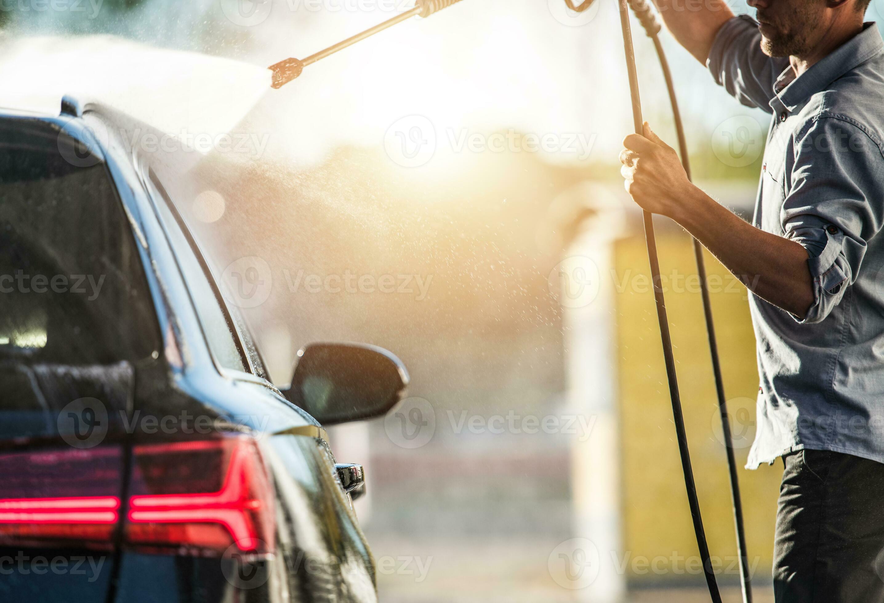 Car Wash Attendant Washing Clients Car. 24524822 Stock Photo at Vecteezy