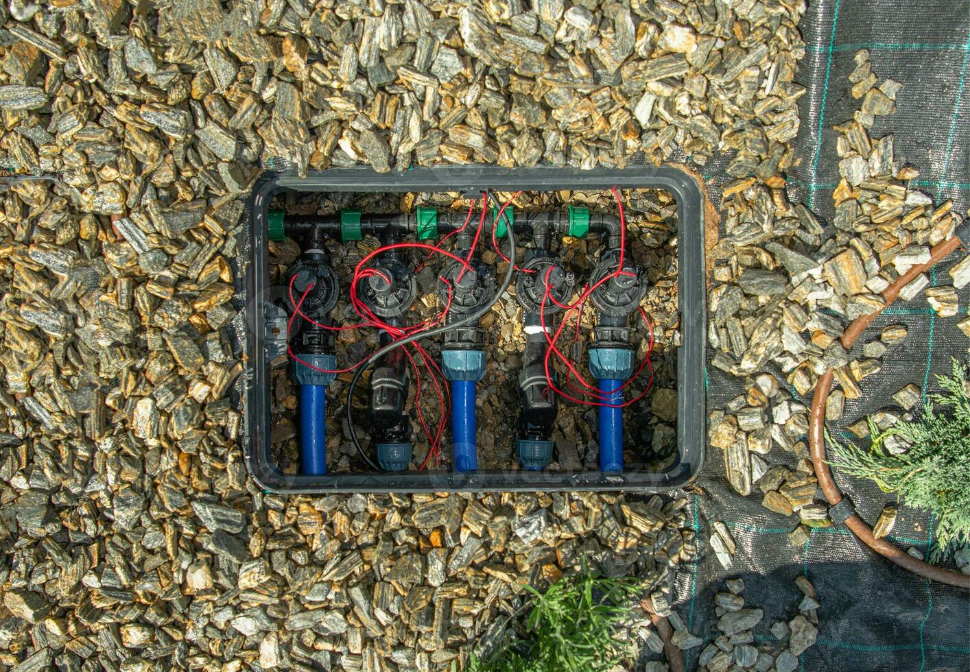 Solenoid Valves In Underground Irrigation System. photo
