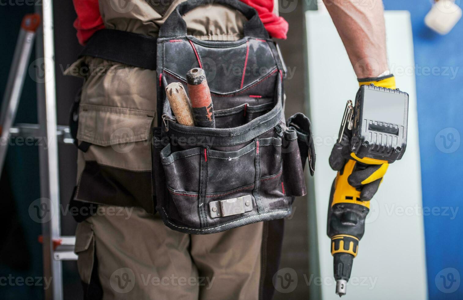 Worker with Drill Driver photo