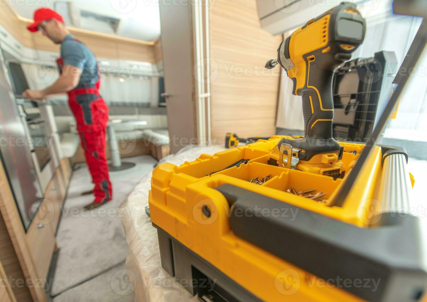 RV Travel Trailer Warranty Service Worker Preparing For His Work photo