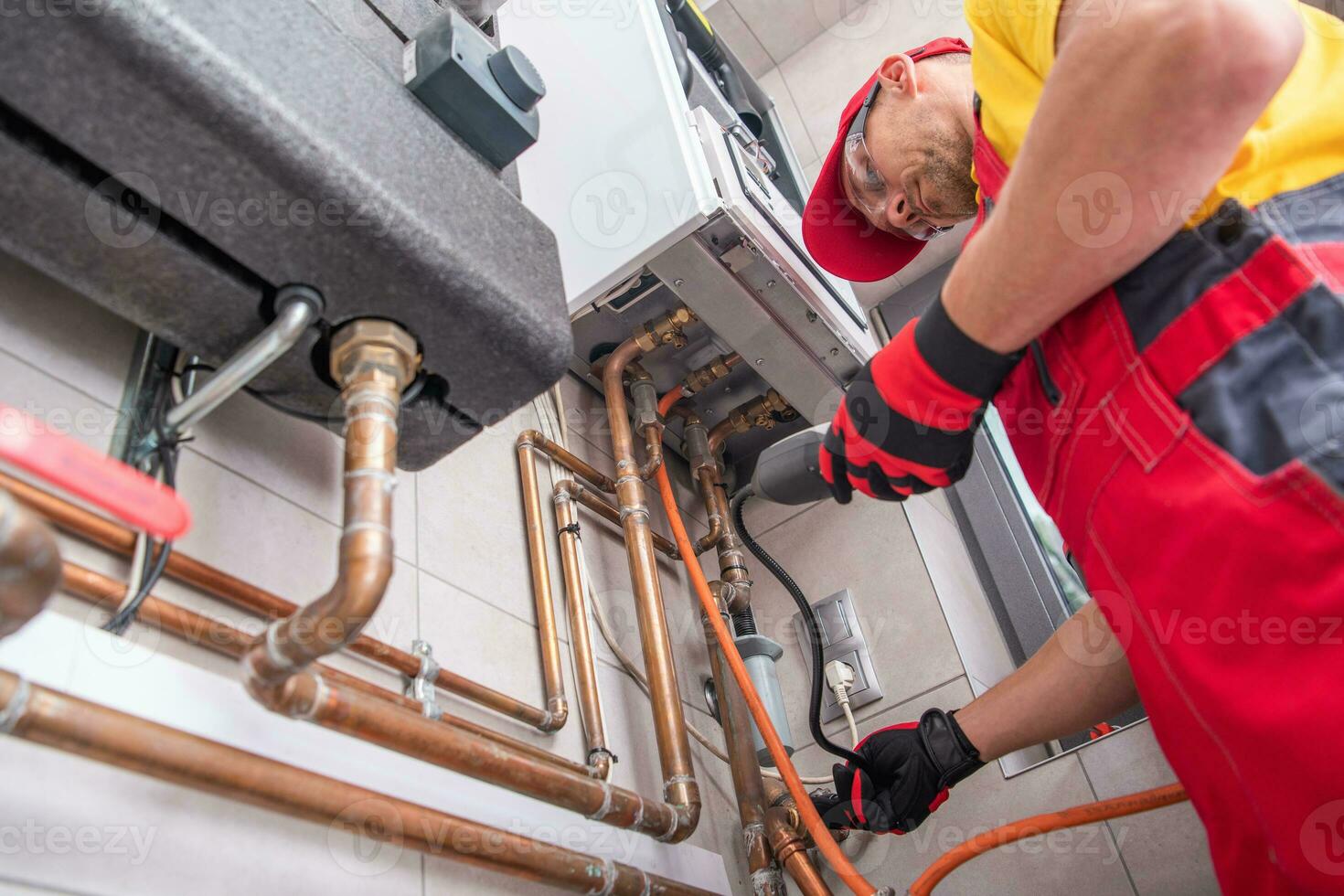 Professional Gas Heating Technician with Gas Detector photo