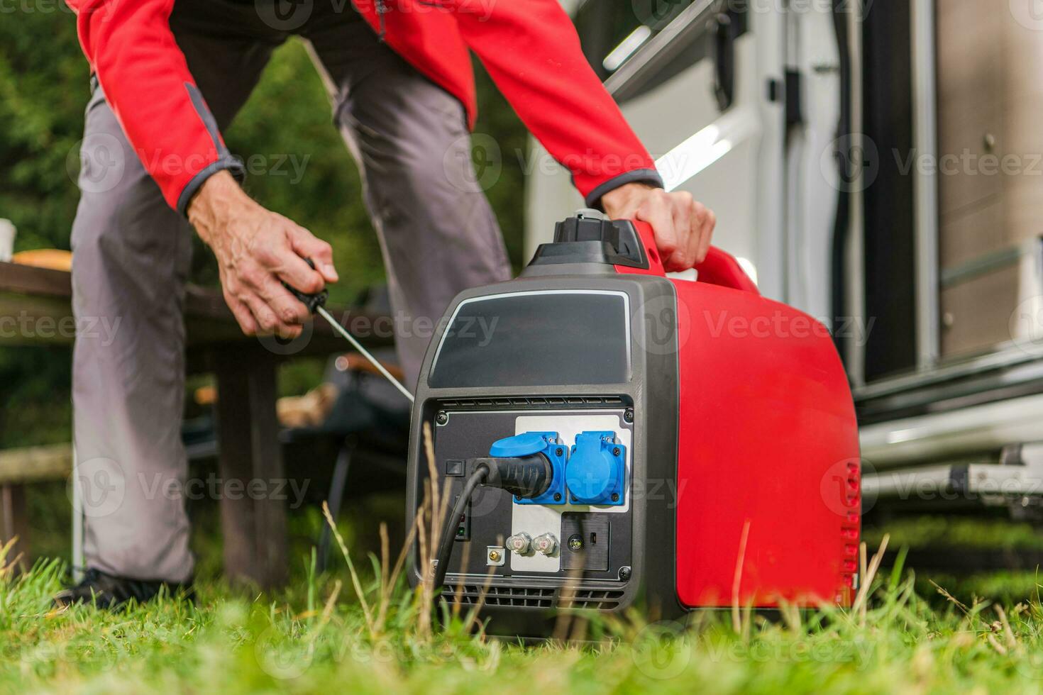 Firing Up Gas Powered Portable Inverter Generator photo