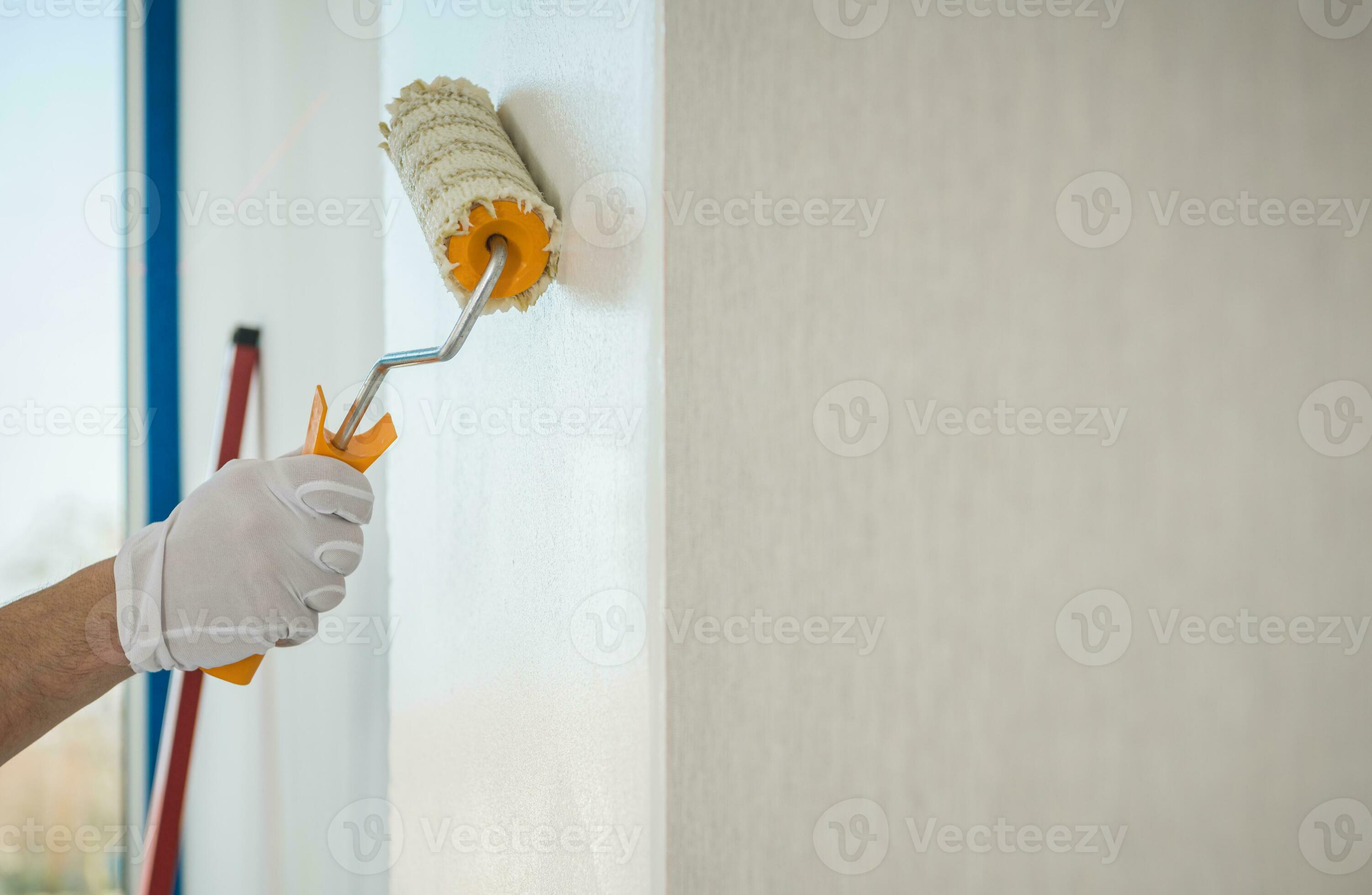 Adhesive Wallpaper Glue Applying Using Roller 24526329 Stock Photo at  Vecteezy