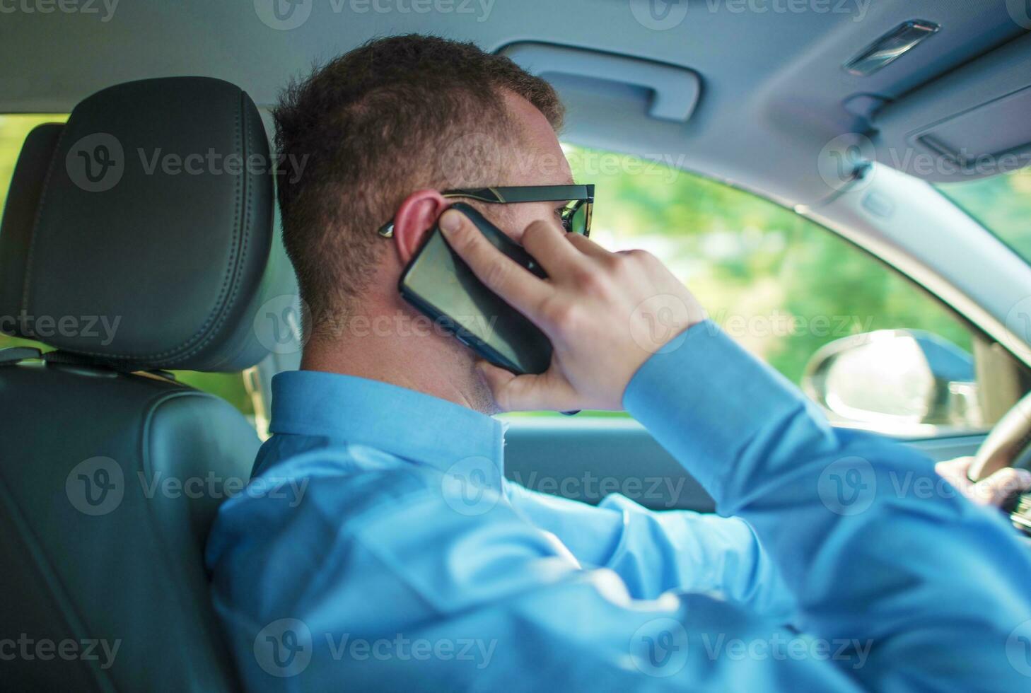 Talking by Phone While Driving photo