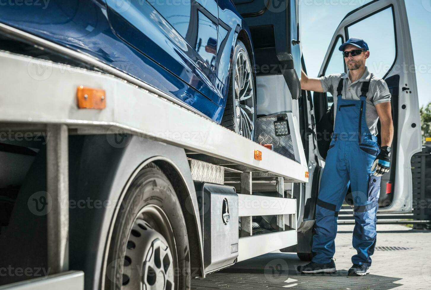 Repo Company Driver Towing Repossessed Vehicle photo