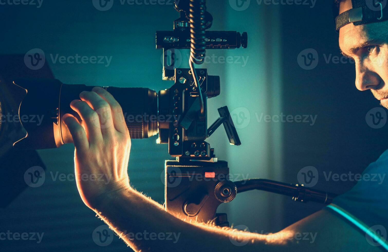 Professional Camera Operator with Pro Digital Equipment Taking Video