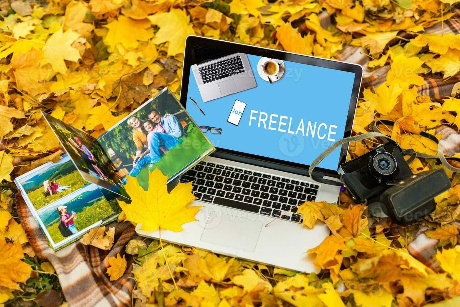 autumn fall flat lay, top view home office table desk. workspace with laptop, chrysanthemum bouquet, pumpkin, leaves, scissors on white background, flat lay, top view photo