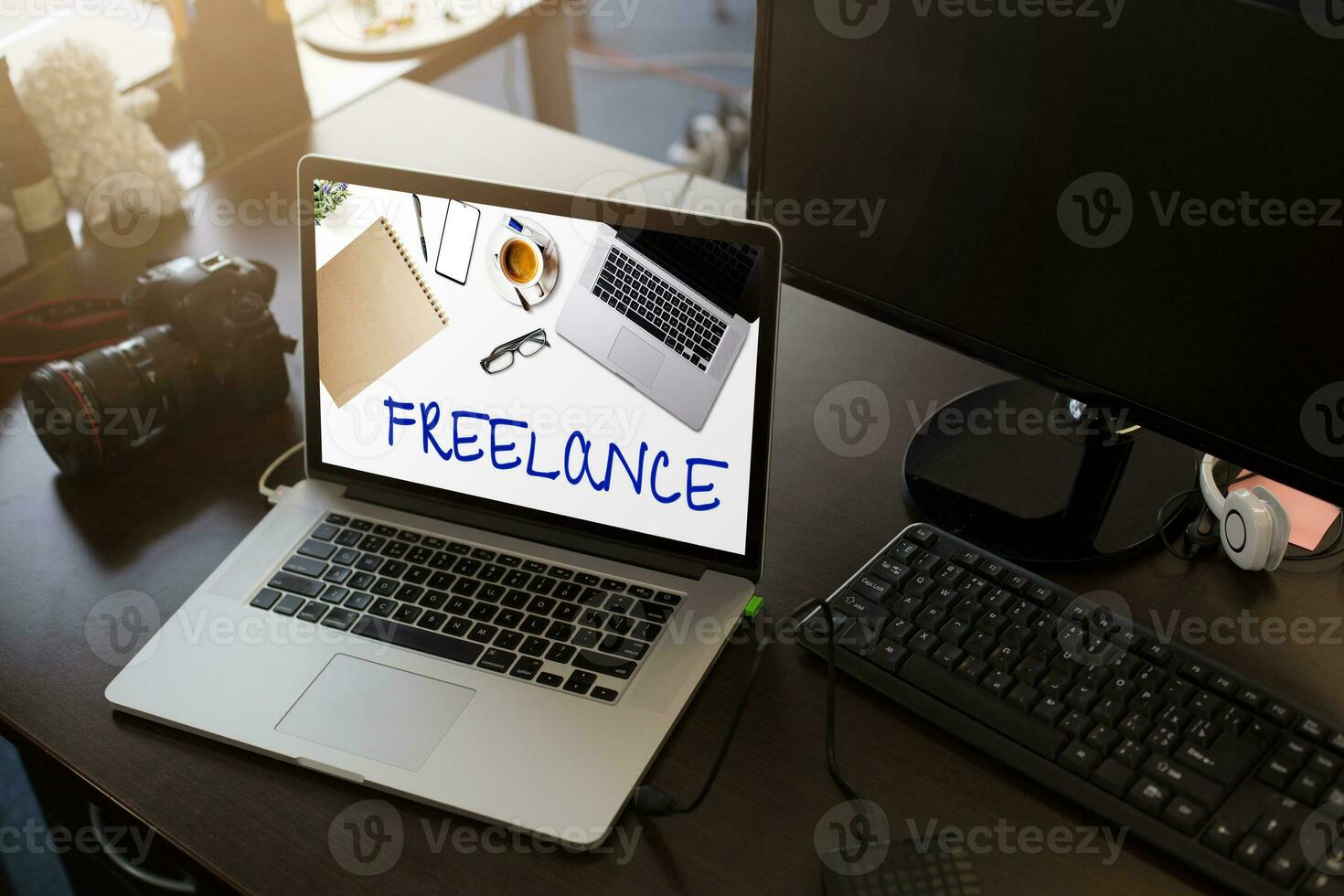 Home freelance desktop with open laptop computer on the table, blank screen for information content or text message photo