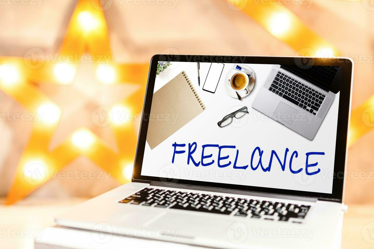 Home freelance desktop with open laptop computer on the table, blank screen for information content or text message photo