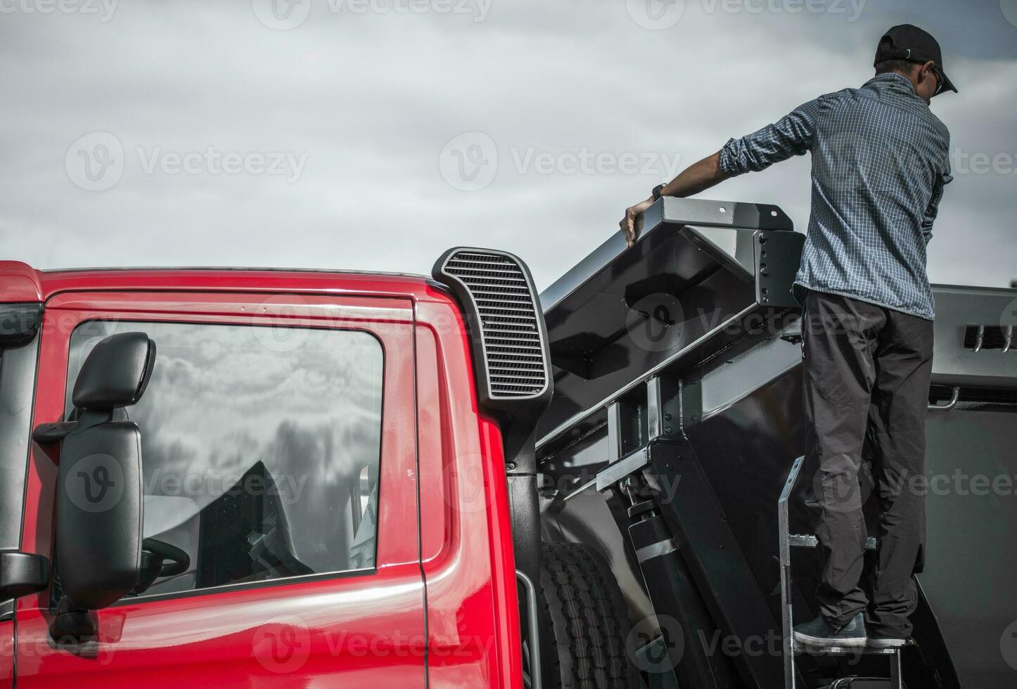 Truck Driver Checking the Load photo