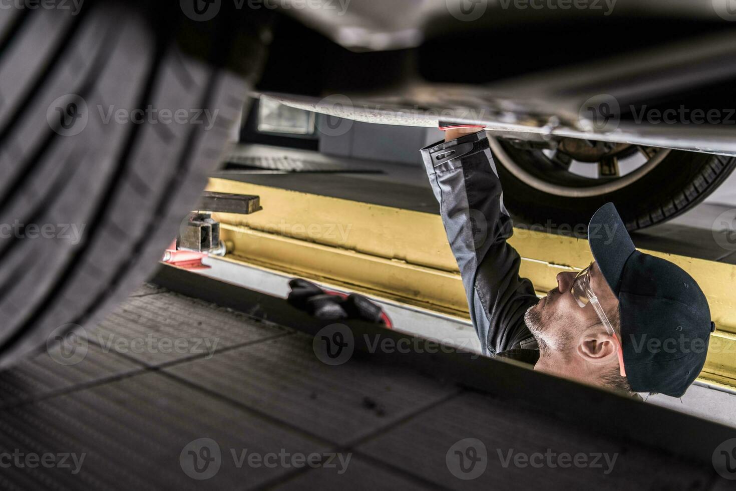 Mechanic Servicing Car photo