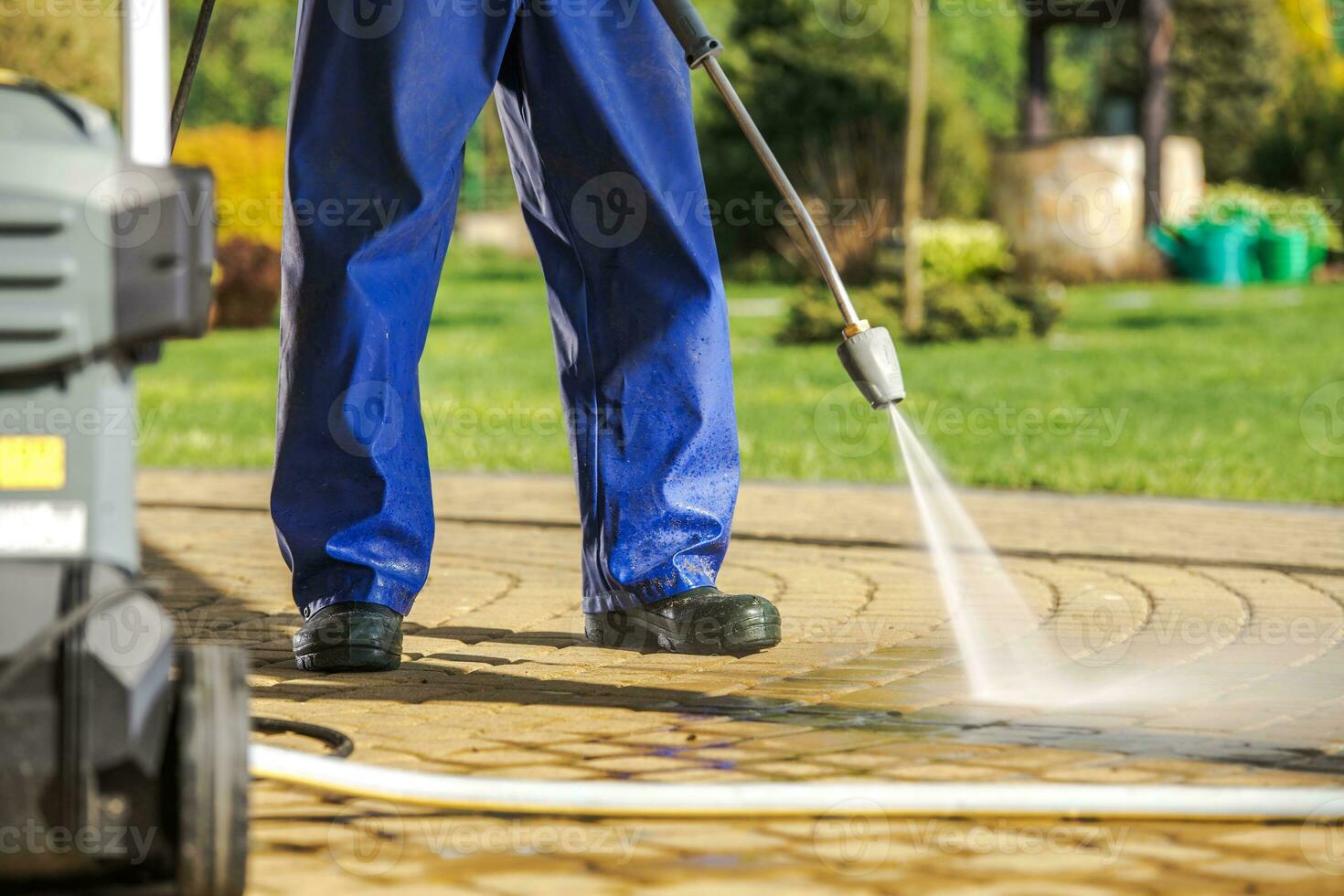 Worker and Pressure Washer photo