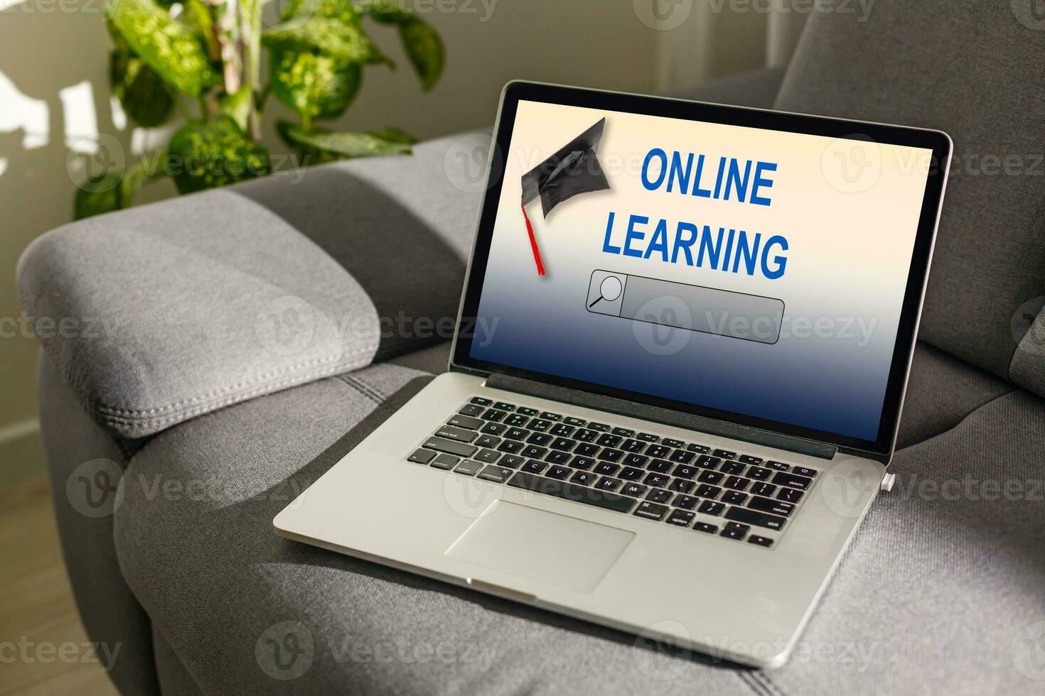 Open laptop with screen with text ONLINE LEARNING photo