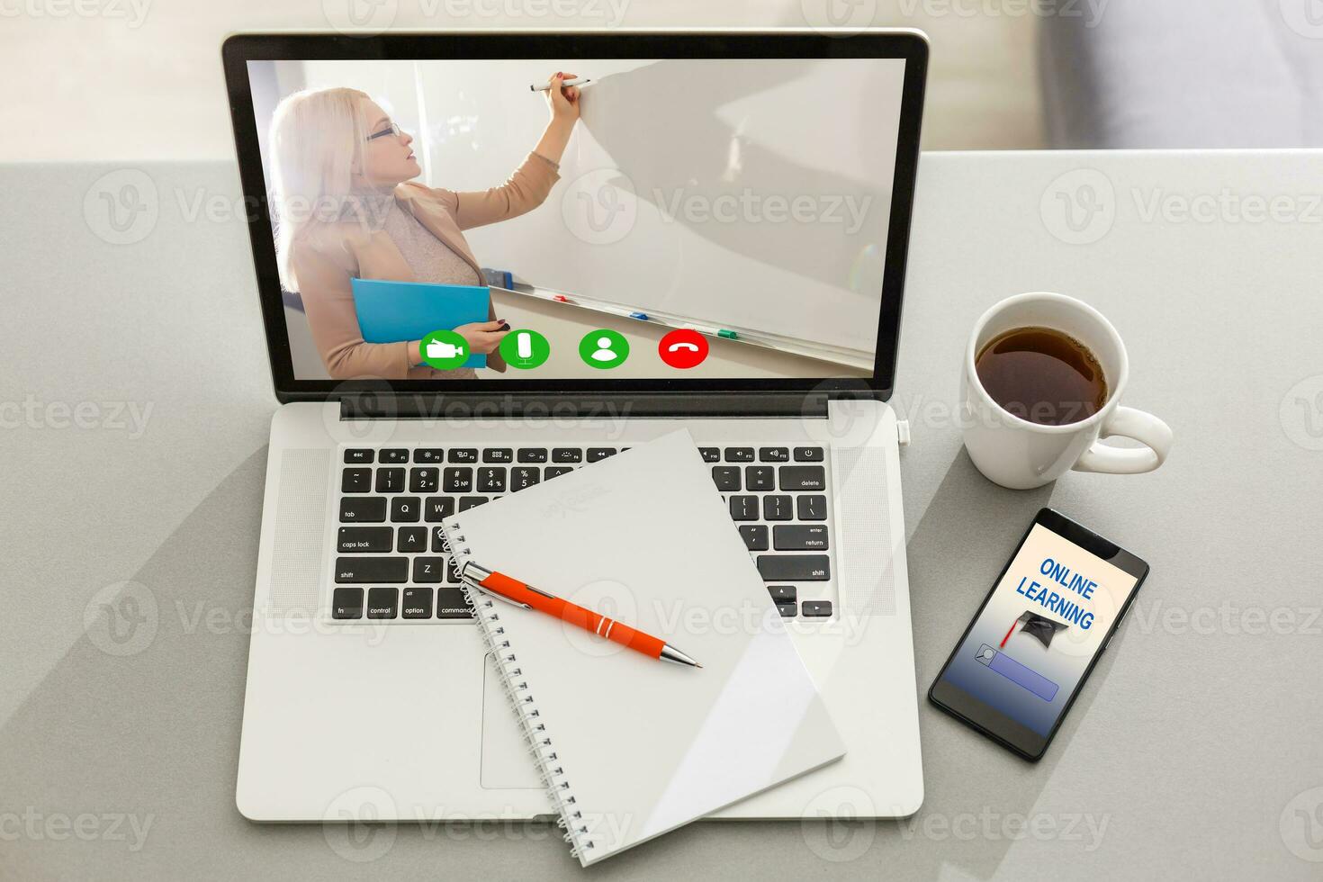 education technology and internet - student with computers studying online. the teacher teaches using video calling on a laptop photo