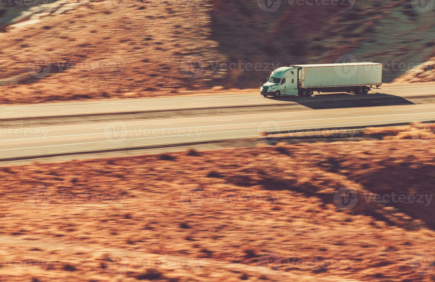 Speeding Semi Trailer Truck on Interstate 70 USA photo